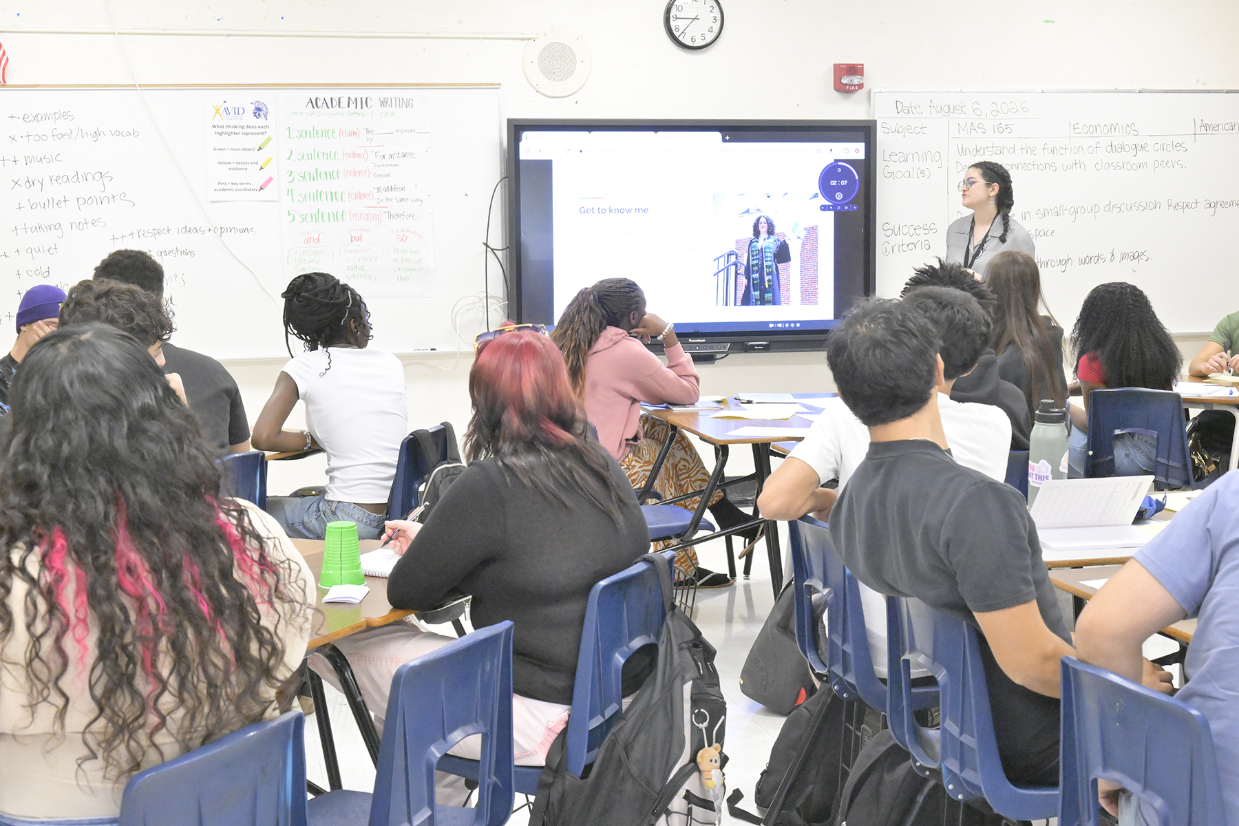 A teacher in front of her high school class