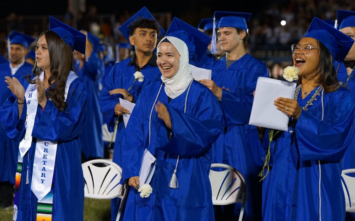 Catalina grads smile and clap during the ceremony